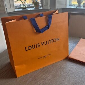 Louis Vuitton Orange shopping bag. New